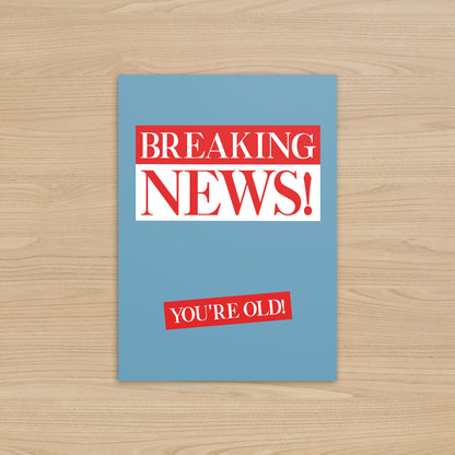 Card with 'Breaking News! You're Old!' text on a blue background