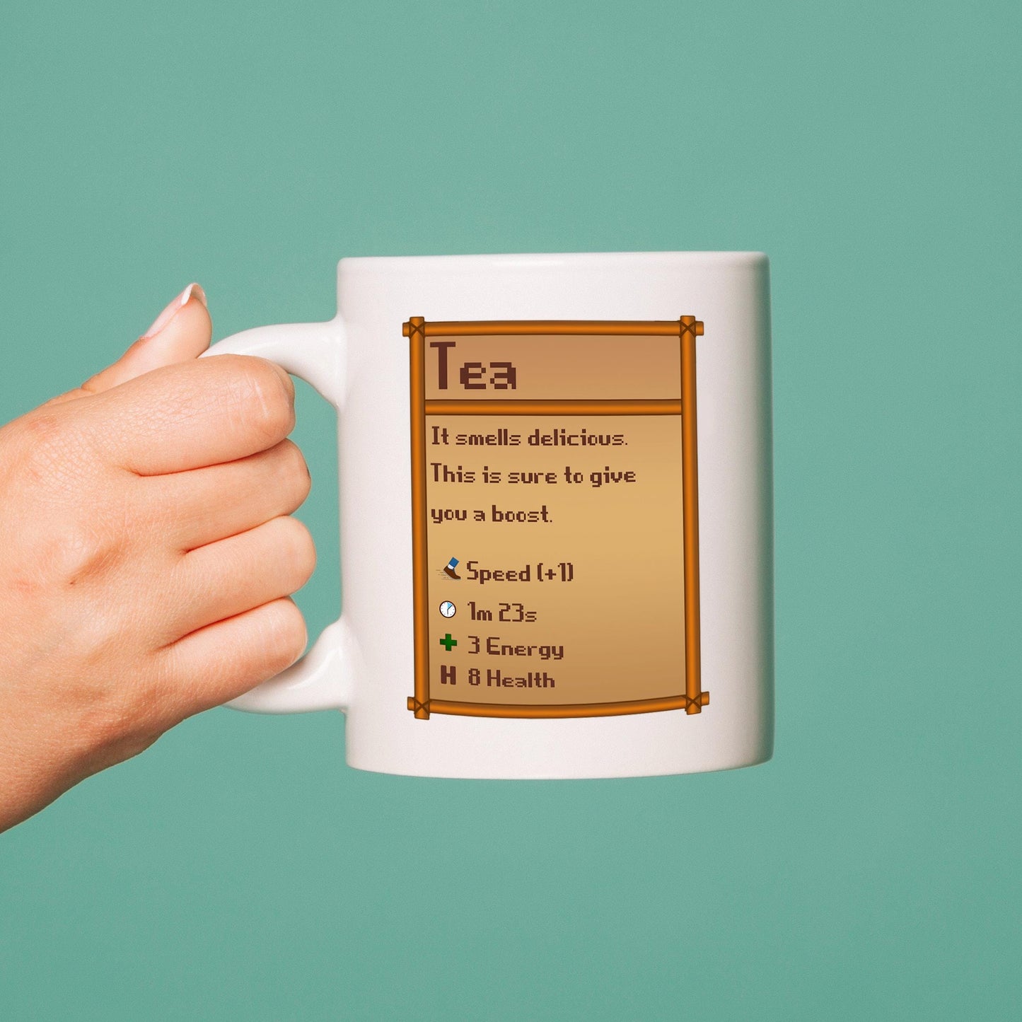 Mug with Stardew Valley tea graphic and text on a teal background