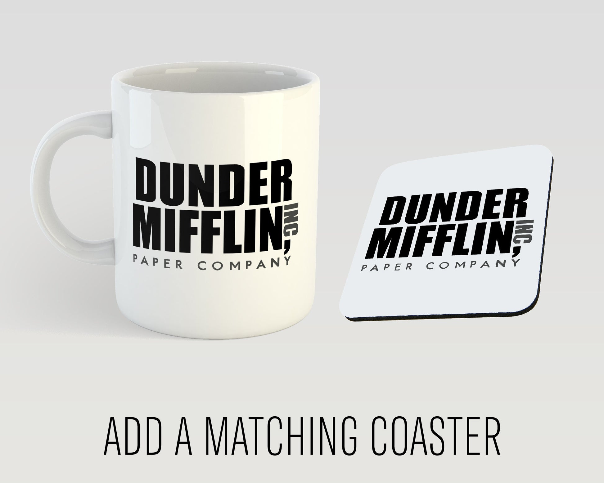 White mug and coaster set with 'Dunder Mifflin, Inc.' text on a light gray background