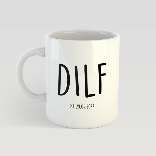 White mug with 'DILF' printed on it against a light gray background