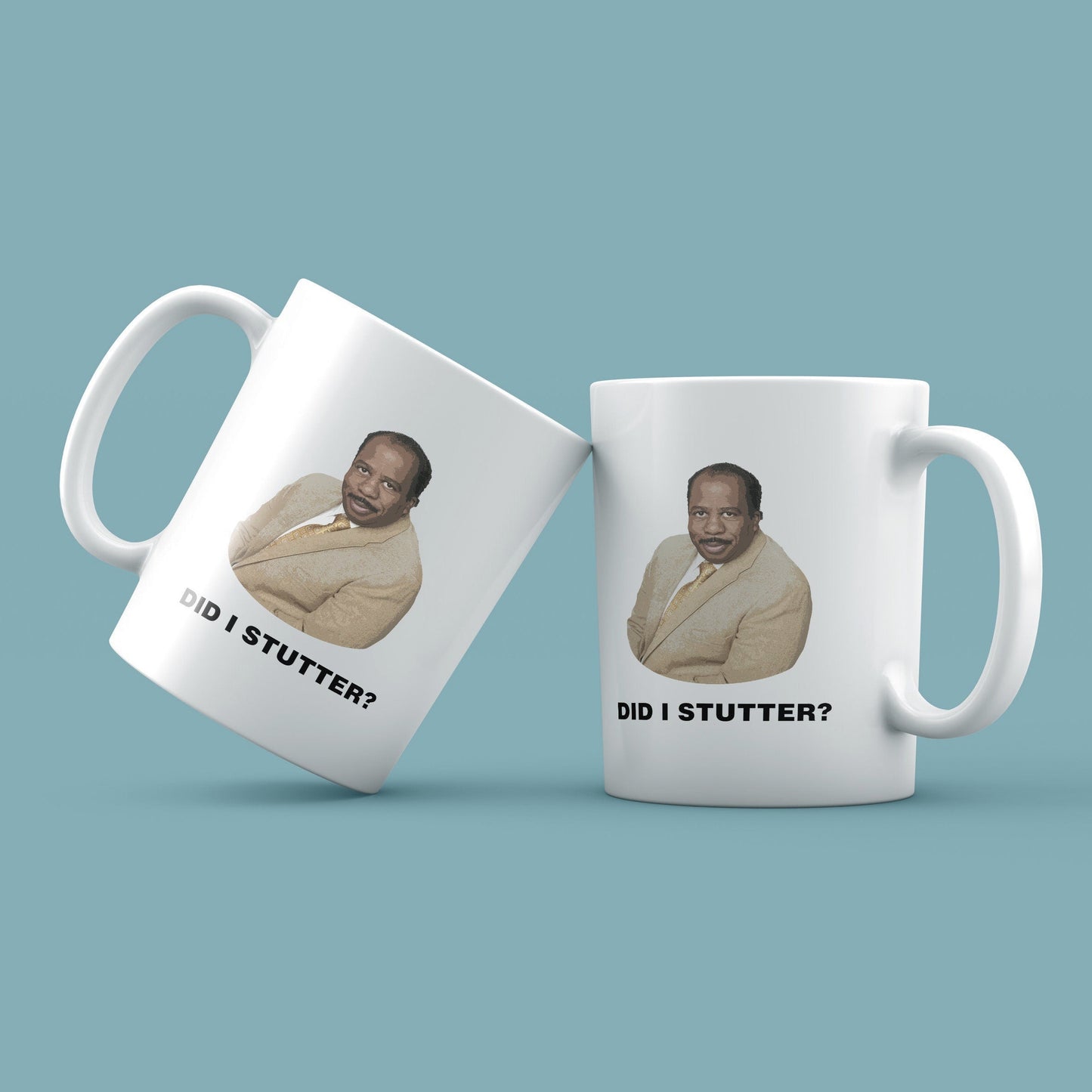 Two white mugs with a printed image and text on a light blue background