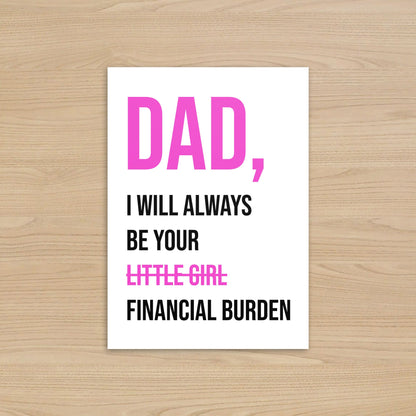 Card with humorous text on a wooden surface