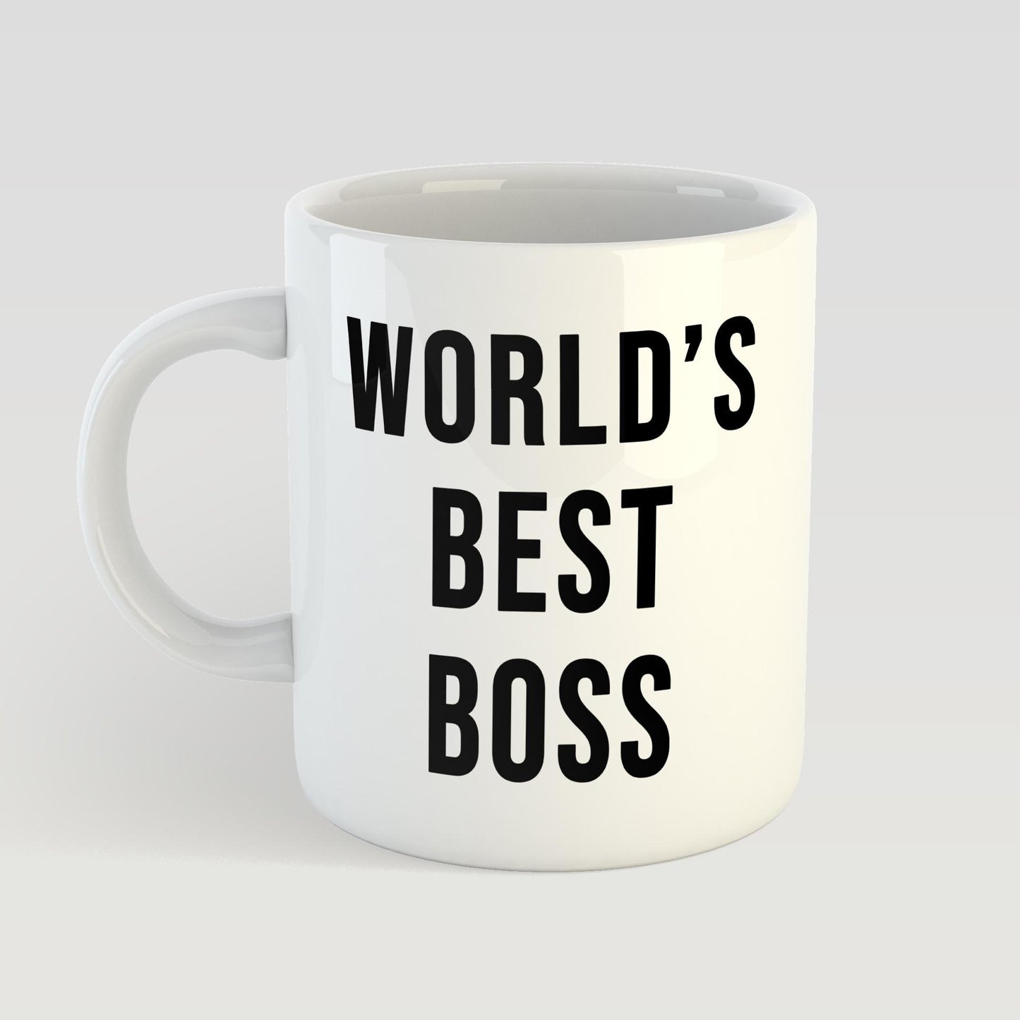 White mug with 'World's Best Boss' text on a light gray background